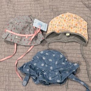 Set of 3 baby girl hats (brand new and gently used)
